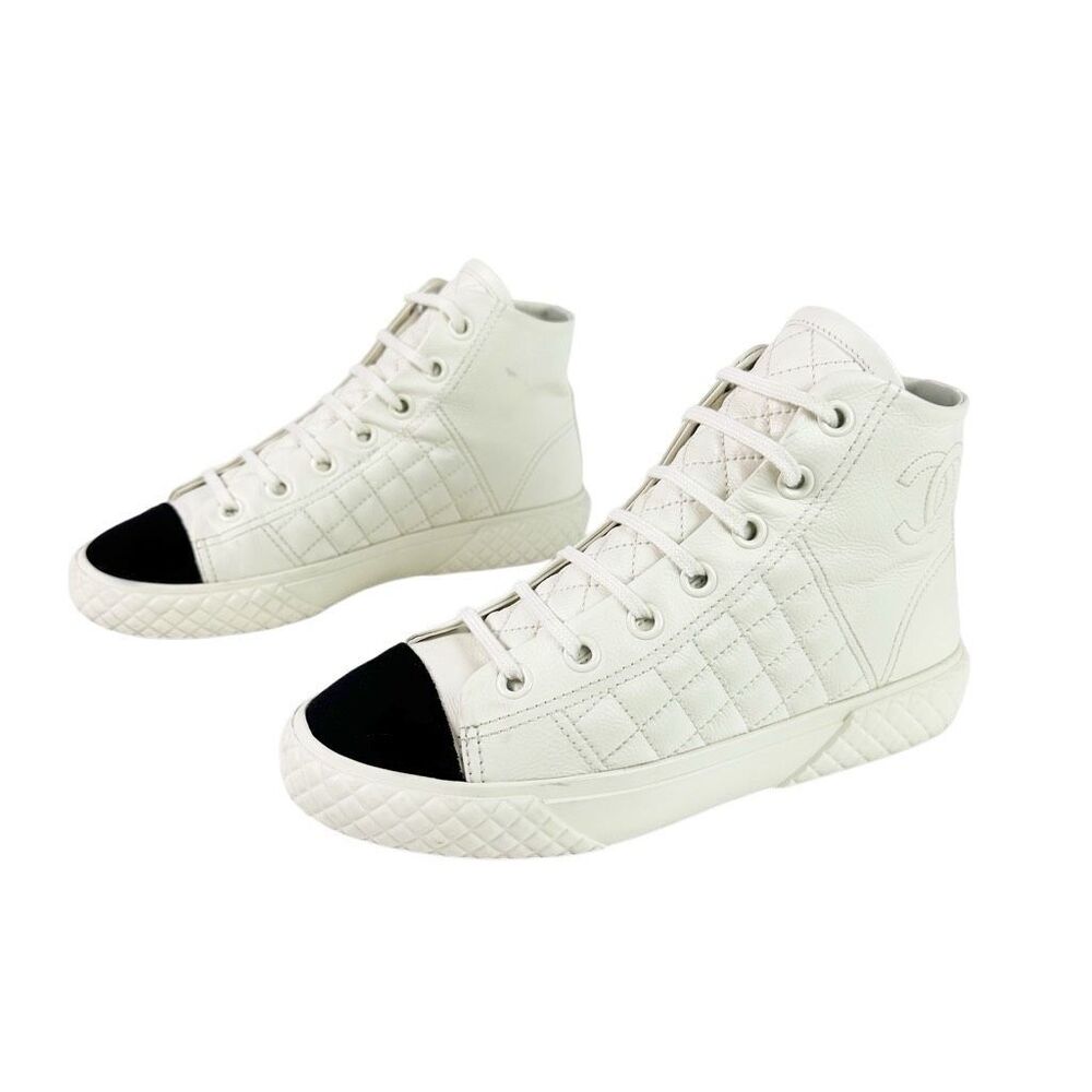 CHANEL White High-Top Quilted Leather Sneakers with Black Toe Cap